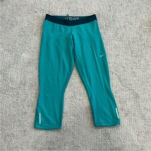 EUC L NIKE dri-fit blue capri spandex with zipper pocket for key teal